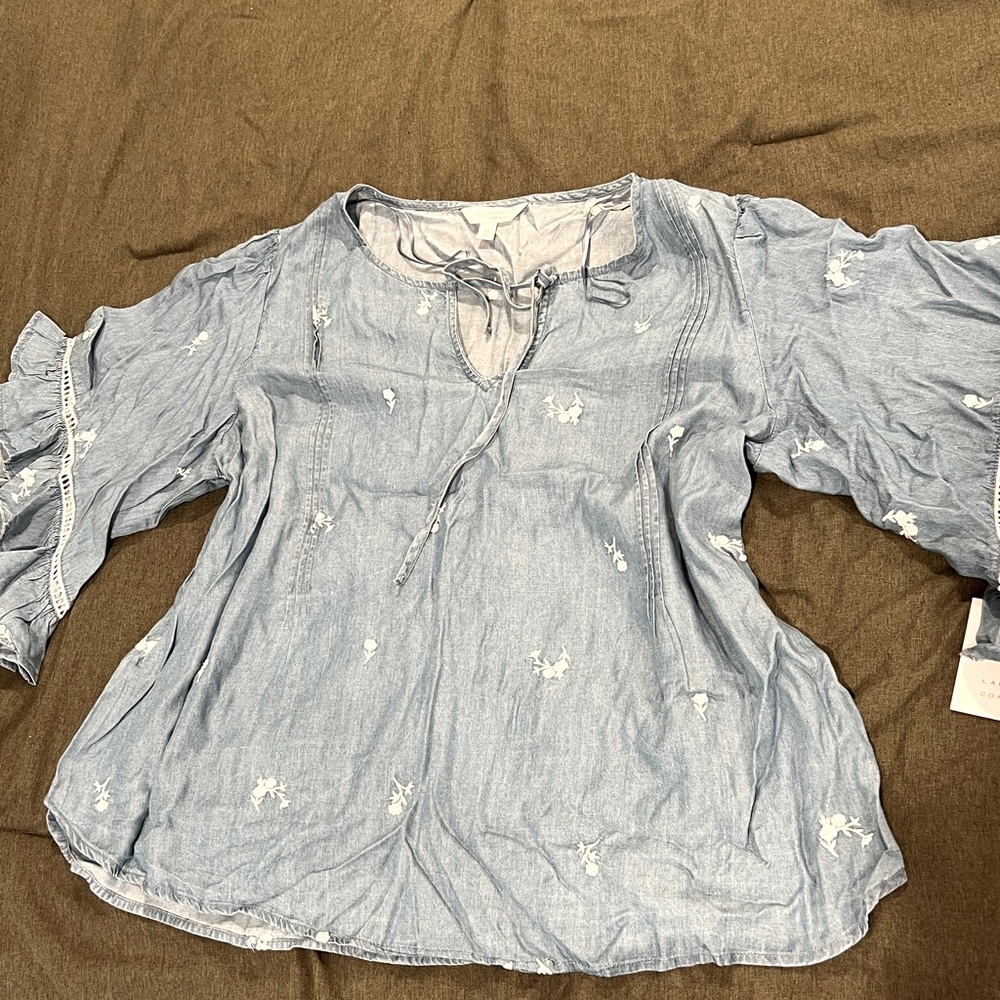 Brand new with tags. Lauren Conrad denim blouse with white details